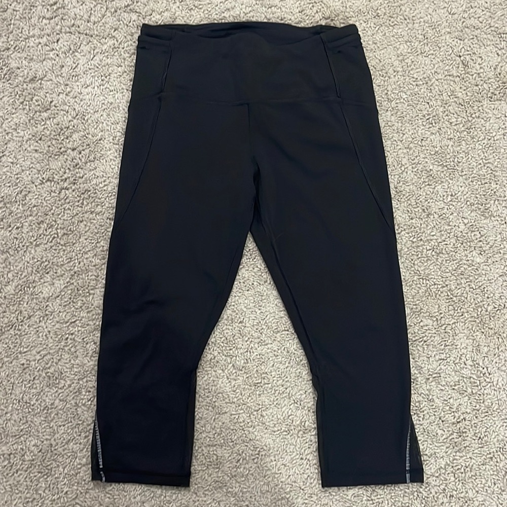 Lululemon crop leggings with mesh detail at bottom